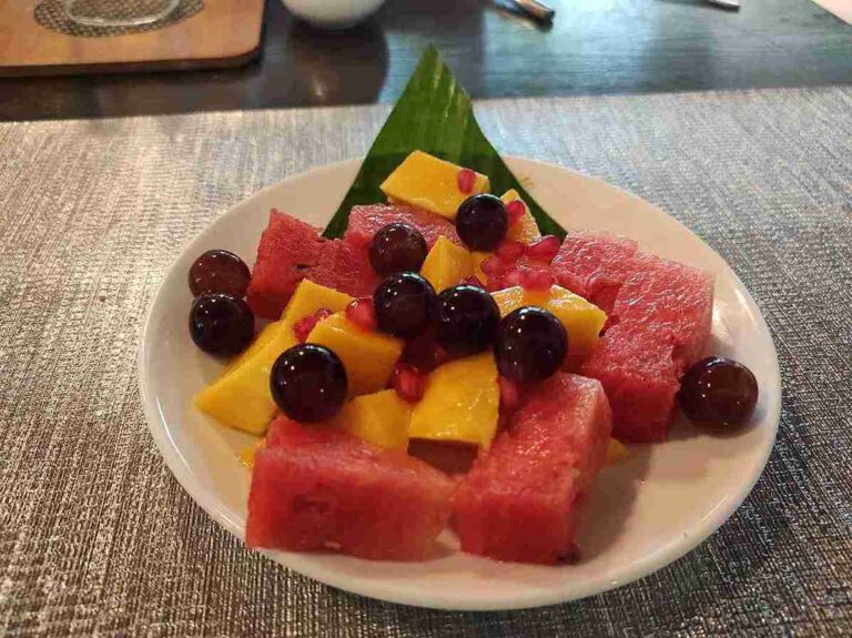 Fresh fruit platter for Ayurvedic diet—watermelon, mango, berries