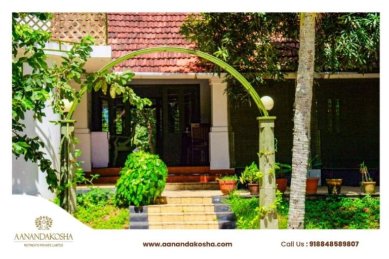 Exterior area of the aanandakosh with entrance showcase in afternoon